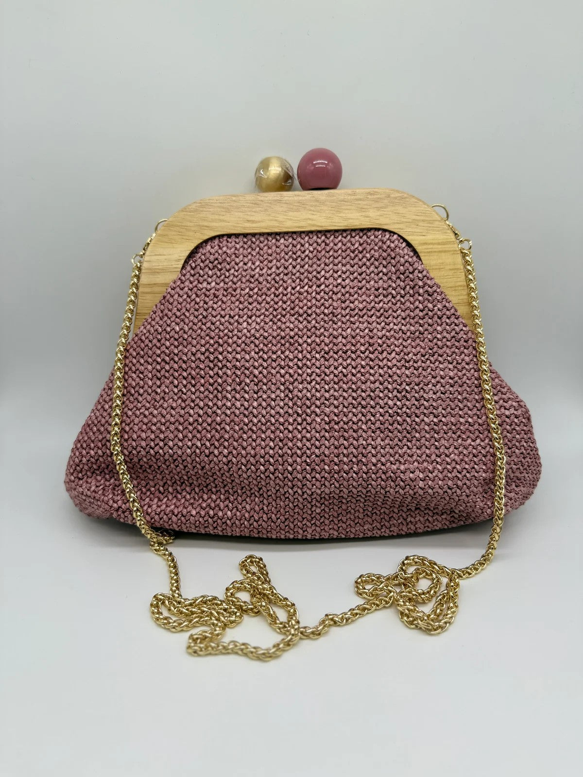 Bolso clutch con cadena
